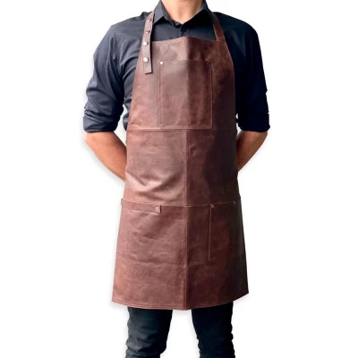 Apron in dark brown leather Apron in dark brown leather