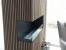 Foco Corner Left 1200 - Modern corner bioethanol fireplace with a sleek black frame and vibrant flames.