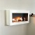 Super simple and sleek white bioethanol fireplace for wall mounting