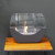 Cradle shaped fireplace in black with two glass panels