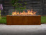Planika Galio Outdoor gas fireplace in corten steel finish and with manual control system
