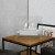 Small tabletop bio fireplace of steel and glass