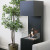 Freestanding bio fireplace opened on three sides making flames more visible.