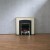 Freestanding fireplace with black insert