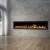 Royal 72 inch wall-mounted electric fireplace with LED flames and decorative crystals/logs