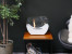 White cradle shaped fireplace with glass panels